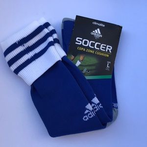 Woman blue and white striped Adidas soccer socks
